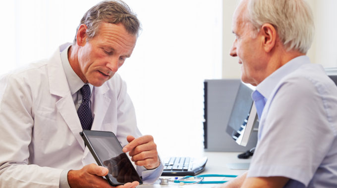 Photo Of A Doctor Discussing Life Expectancy With A Cancer Patient