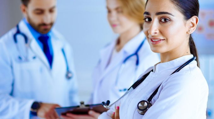 Temporary Nurse From A Nurse Staffing Agency Working In Hospice