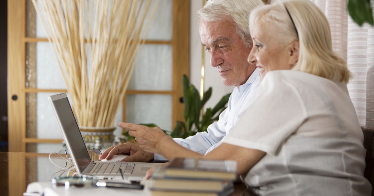 Senior Couple Researching Social Security Benefits While On Hospice Care